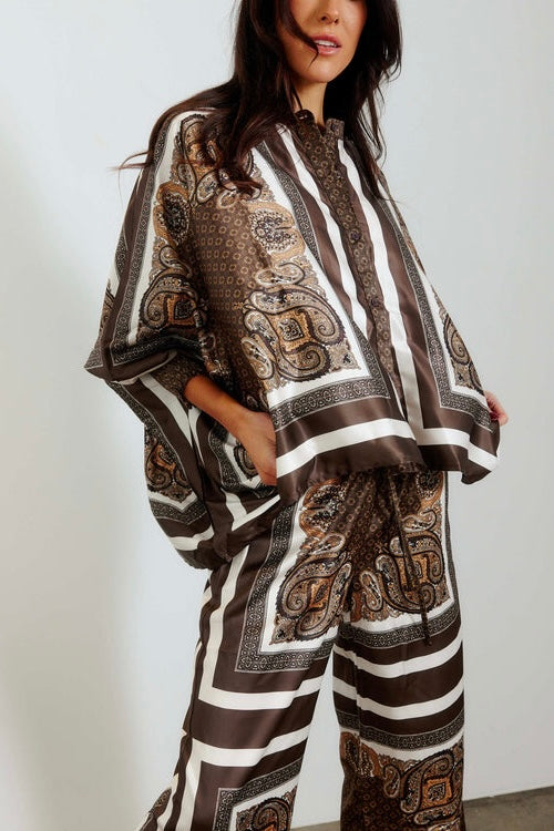 Taormina Scarf Pant — front view of wide-leg scarf-print pant styled with matching Taormina Scarf Top, hands in pockets, white studio background